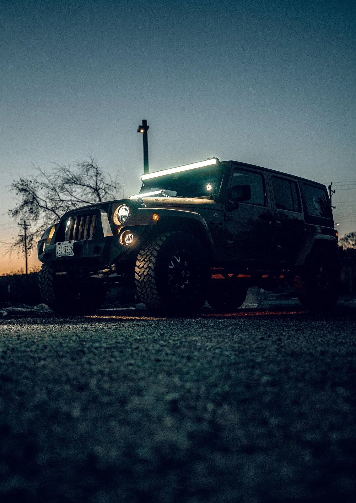 A Jeep photographed at blue hour