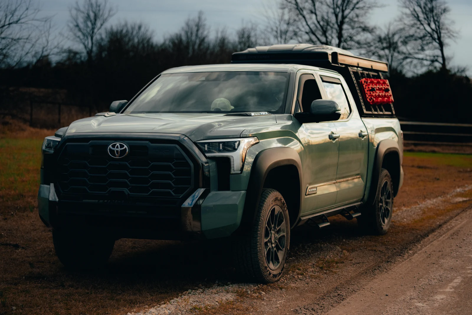 Toyota pickup on a field road